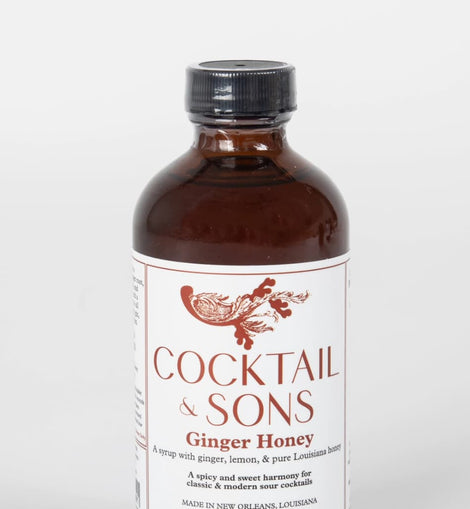 Cocktail and Sons ginger honey syrup bottle made in New Orleans, cocktail mixer with ginger, lemon, and Louisiana honey