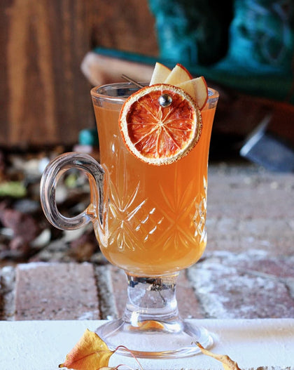 Cocktail and Sons ginger honey syrup bottle made in New Orleans, cocktail mixer with ginger, lemon, and Louisiana honey