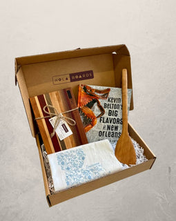 New Orleans Cooking Gift Box with Petit Fromage Board, Louisiana Tea Towel, 12" Roux Spoon, and Kevin Belton’s Big Flavors of New Orleans Cookbook.