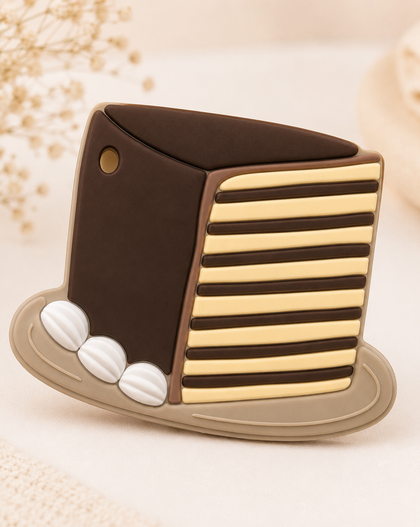 Decorative item resembling a top hat with striped design on a textured beige background