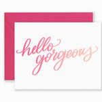 Greeting card with hand-lettered “Hello Gorgeous” design in stylish lettering, paired with kraft envelope