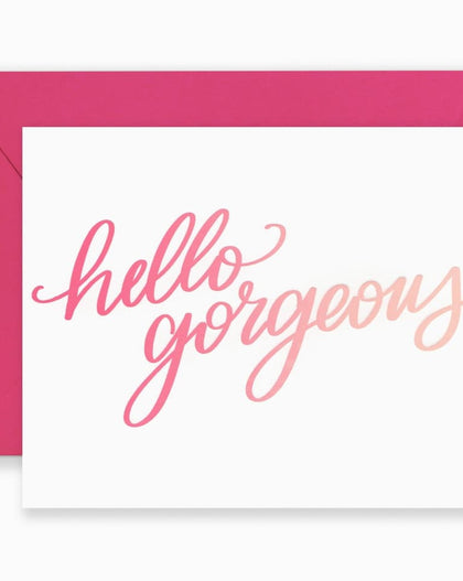 Greeting card with hand-lettered “Hello Gorgeous” design in stylish lettering, paired with kraft envelope