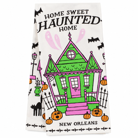 Home Sweet Haunted Home New Orleans Halloween kitchen towel with colorful haunted house, bats, ghosts, pumpkins, and black cat.