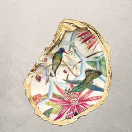 oyster shell trinket dish with hummingbird and floral design and gold edge