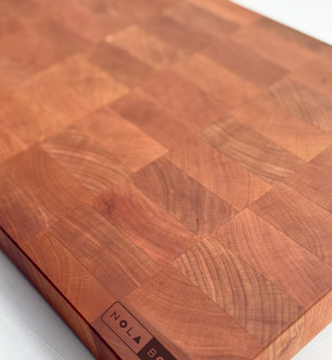 Cherry wood board inspired by New Orleans Flag Boy tradition