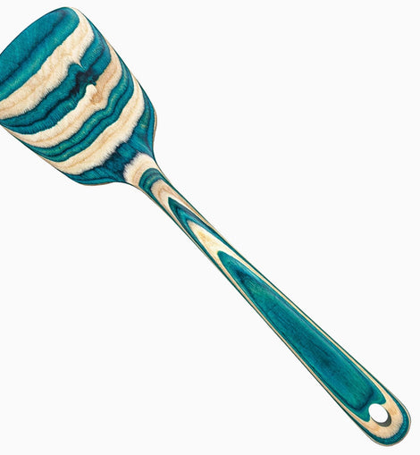 Teal and white swirled layered birch spatula from the Mykonos Collection, inspired by Mediterranean coastal design.

