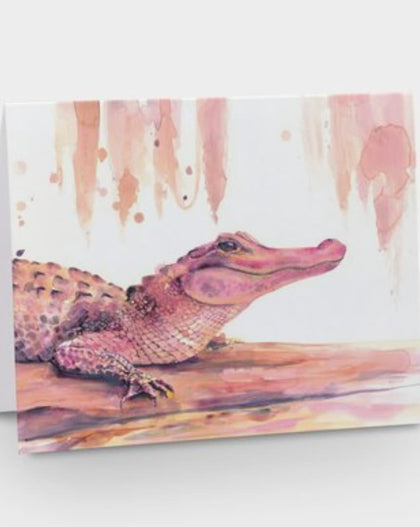 pink watercolor alligator greeting card on white background