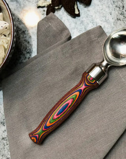 Stainless steel ice cream scoop with rainbow swirl handle