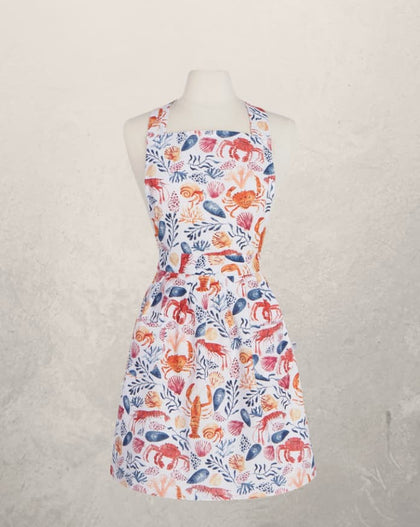 cotton apron with colorful seafood print including crabs shrimp and shells