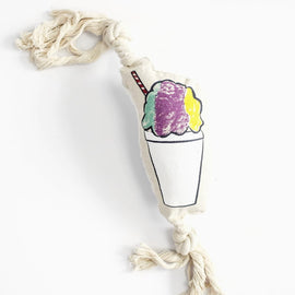 snowball themed dog toy with rope ends and squeaker