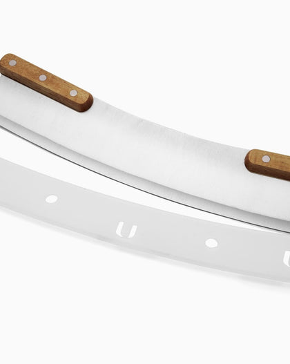 Stainless steel pizza rocker with artisan-style acacia wood handle and clear edge protector, 13-inch blade