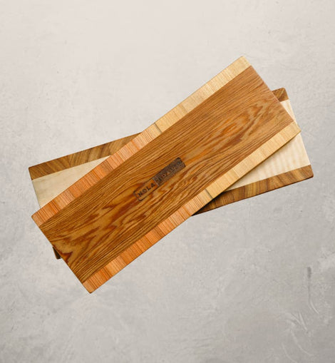 Tracks accoutrement board made from mixed hardwood, slim board designed for olives, jams, and layering with charcuterie boards