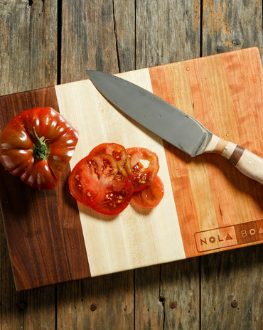 Trinity cutting board with three-panel design in cherry, maple, or walnut, inspired by New Orleans holy trinity ingredients