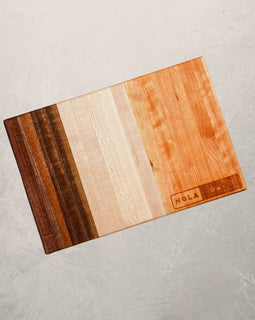 Trinity cutting board with three-panel design in cherry, maple, or walnut, inspired by New Orleans holy trinity ingredients