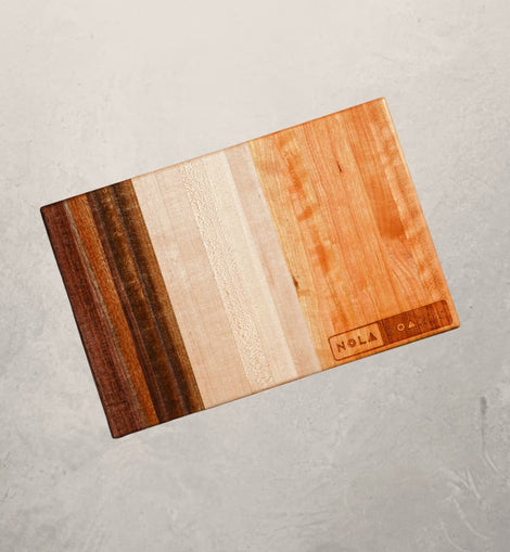 Trinity cutting board with three-panel design in cherry, maple, or walnut, inspired by New Orleans holy trinity ingredients