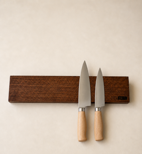 18-inch natural edge walnut magnetic knife holder with knives on a clean neutral background