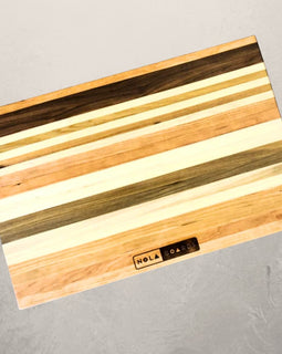 Wild Chop-itoulas mixed wood charcuterie board with cherry, maple, sinker cypress, and walnut, inspired by New Orleans street Tchoupitoulas
