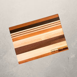 Wild ChopItoulas thick cutting board handcrafted in cherry, maple, sapele, or walnut, compact 10x14 chopping block for heavy-duty kitchen use