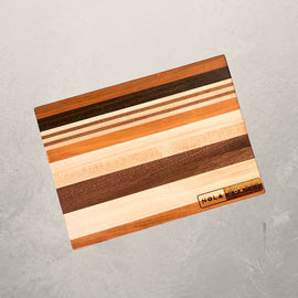 Wild ChopItoulas thick cutting board handcrafted in cherry, maple, sapele, or walnut, compact 10x14 chopping block for heavy-duty kitchen use