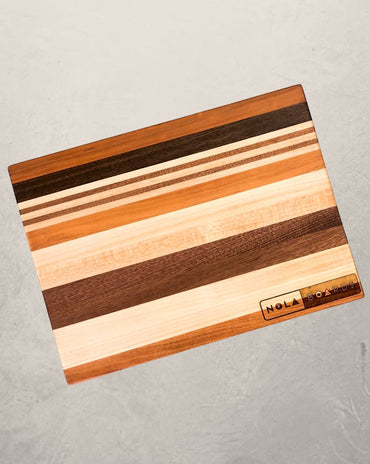Wild ChopItoulas thick cutting board handcrafted in cherry, maple, sapele, or walnut, compact 10x14 chopping block for heavy-duty kitchen use
