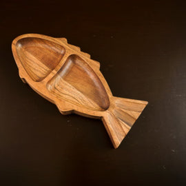 Handcrafted wooden fish-shaped tray with two serving sections and natural wood finish