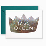 Greeting card with hand-lettered “Yass Queen” text in bold style, shown with kraft envelope